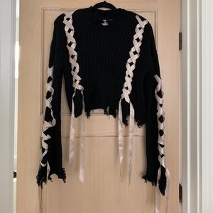 Black with pink ribbon sweater